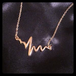 Heart rhythm necklace